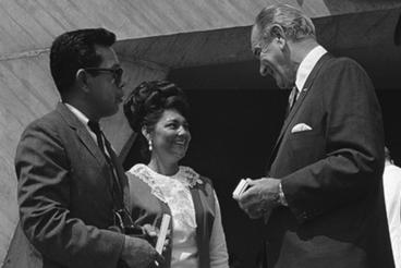 The 1968 Fair Housing Act legislatively barred restrictive covenants in housing. In this photo, President Lyndon B. Johnson presents a souvenir pen to Mr. and Mrs. Lupe Arzola after signing the act Aug. 1, 1968, in Washington. The couple were residents of the oldest federally subsidized public housing project in Austin, Texas.